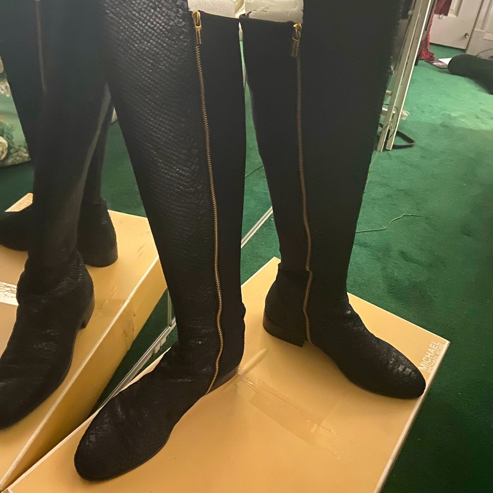 This are almost new Michael Kors riding boot .
